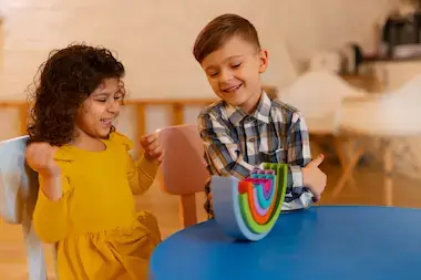 two beautiful child playing in child daycare